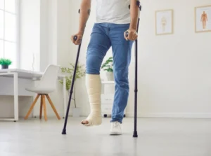 handicapped-male-person-broken-leg-600nw-2680362993